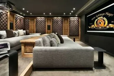 Private cinema room with plush seating in a luxury Los Cabos villa