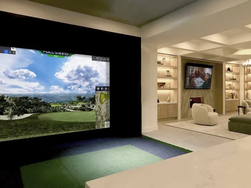 Luxury home entertainment center with indoor golf simulator in a villa