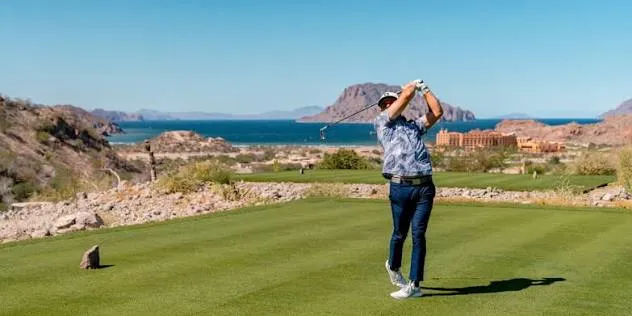 Golfer at a luxury course in Los Cabos
