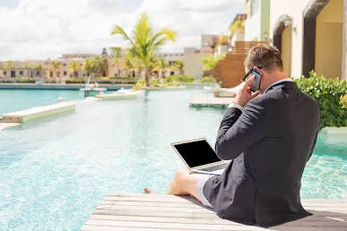 Executive working from a villa terrace in Los Cabos