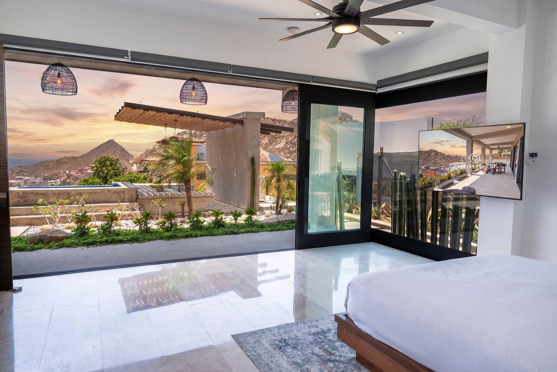 Master suite with king bed and ocean view at Villa Guadalupe