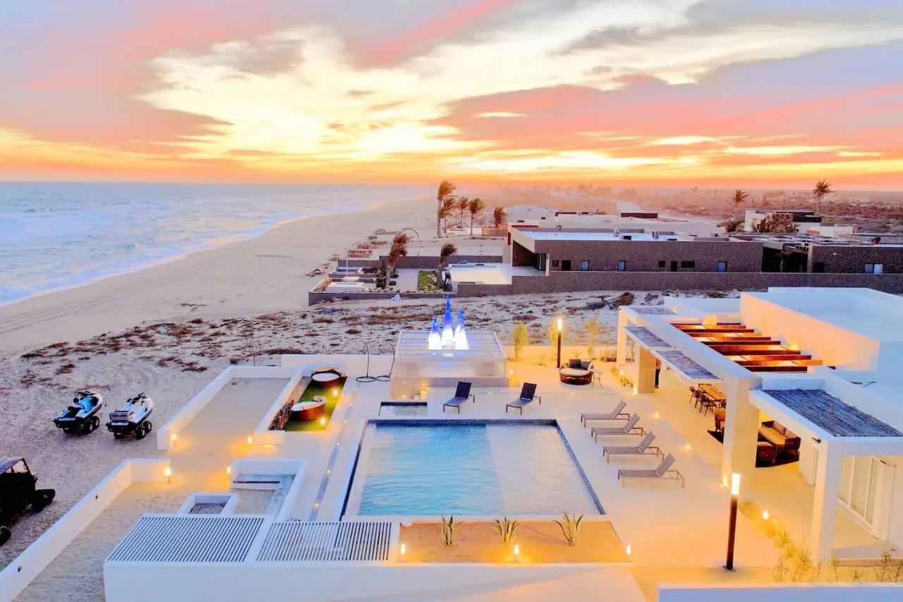 East Cape villa pool terrace with direct beach access and ocean views