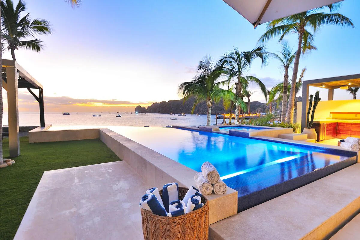 Luxury villa with pool at sunset in Los Cabos