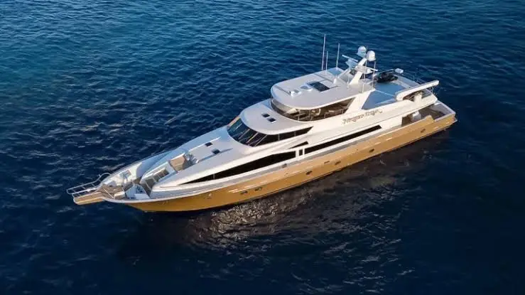 Luxury yacht docked near a villa in Cabo San Lucas