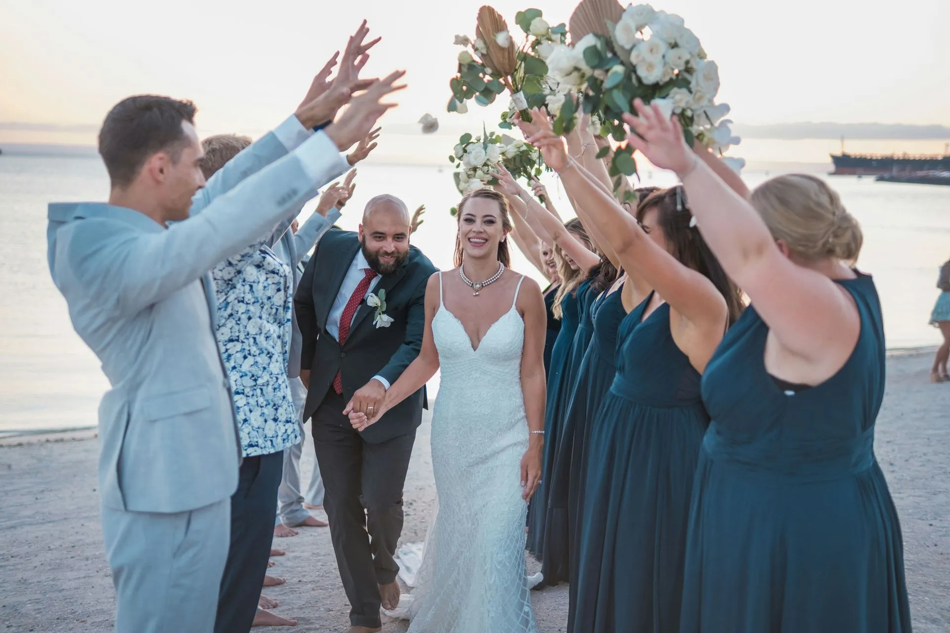 Newlyweds walking out after their wedding ceremony in Cabo