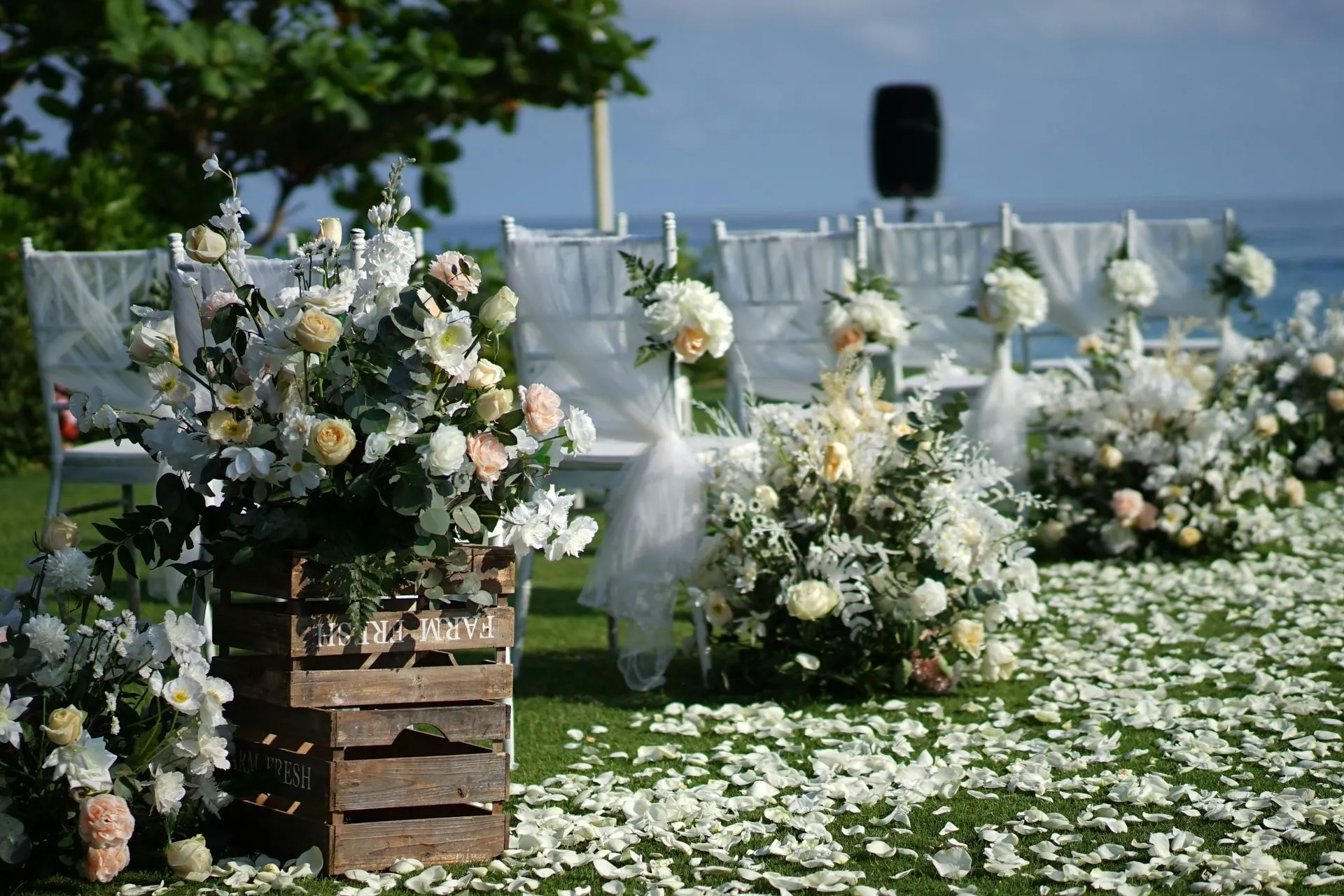 Wedding florals for a ceremony aisle in Cabo