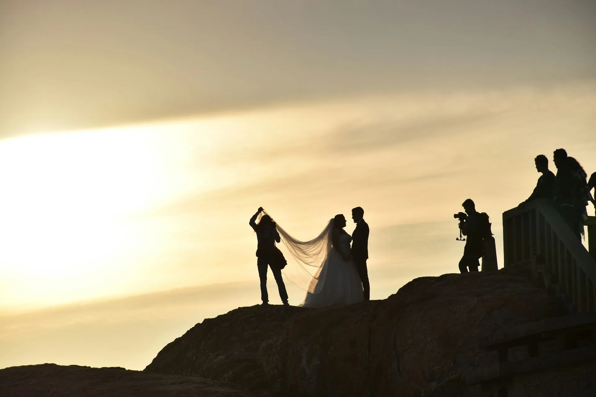 Wedding photographer and videographer at sunset in Cabo